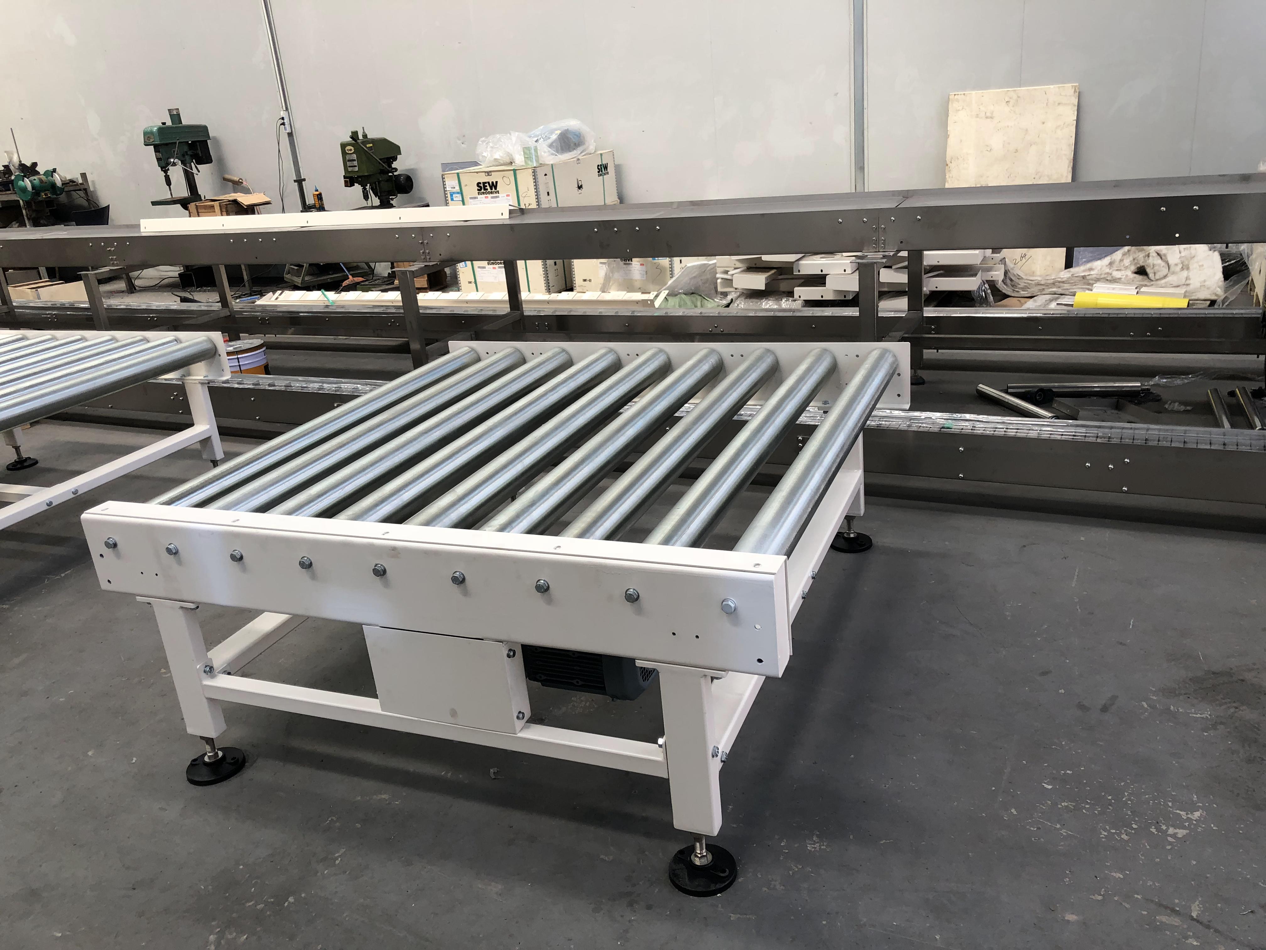 動力滾筒輸送機的設(shè)計案列